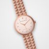 Montre femme Ifrane Rose Horlova – vue de trois-quarts, cadran rose poudré, bracelet maille ton or rose